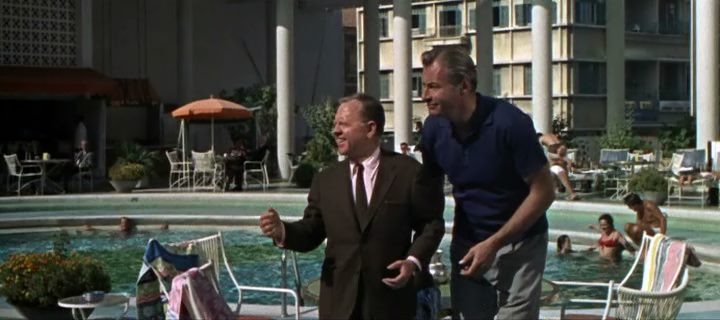 Mickey Rooney and Lex Barker poolside at the Phoenicia Hotel in <em>24 Hours to Kill</em>