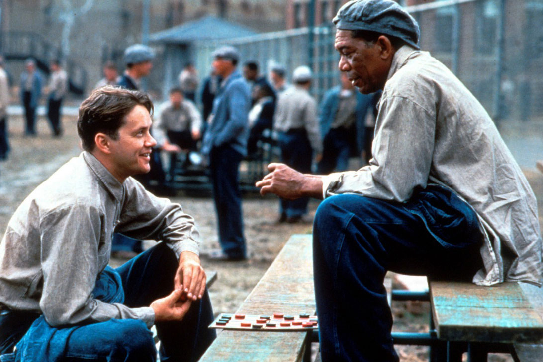 Andy (Tim Robbins) and Red (Morgan Freeman) in <em>The Shawshank Redemption</em>