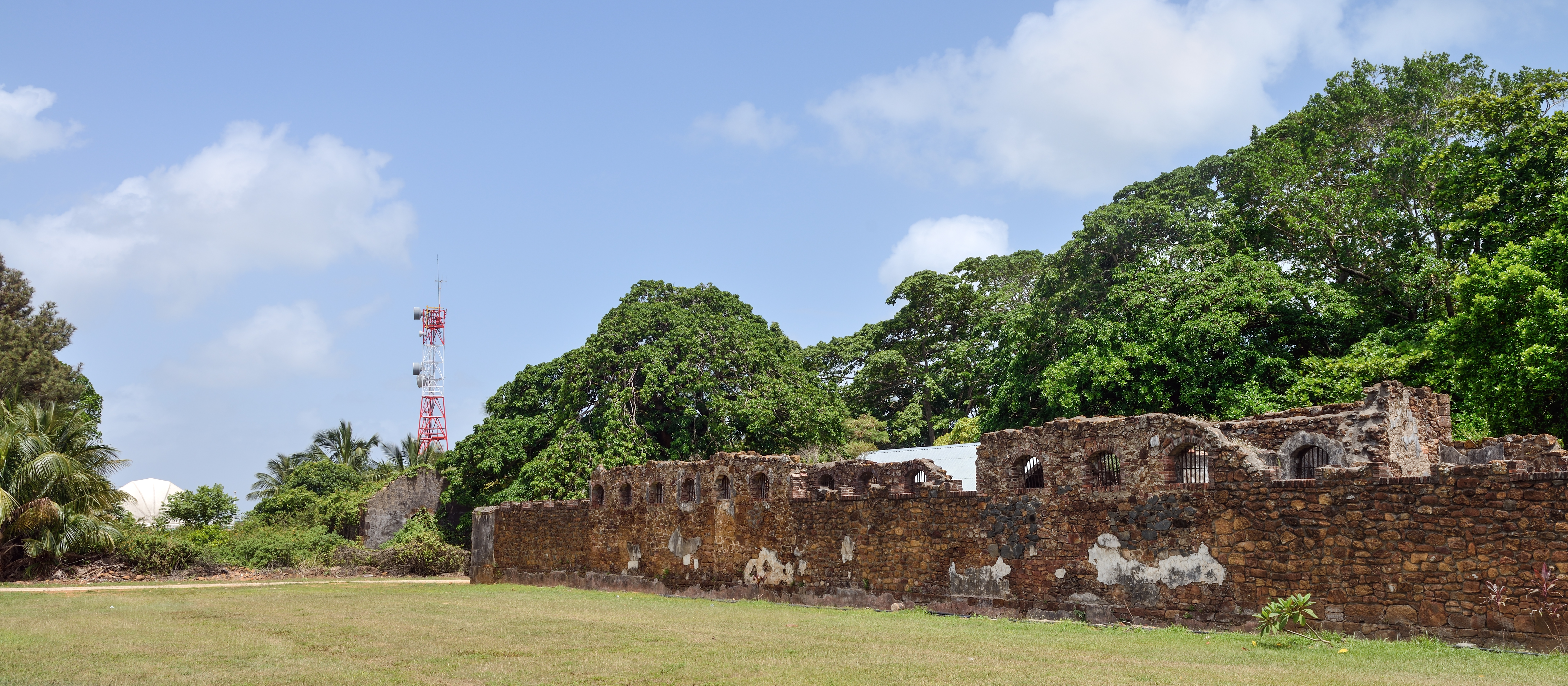 Past and present: ruins of the penitentiary in front and current rocket tracking station in the background Past and present: ruins of the penitentiary in front and current rocket tracking station in the background